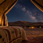 Sleeping in a Sahara desert camp under the stars in Morocco.