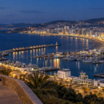 Tangier Morocco marina and bay illuminated at night.